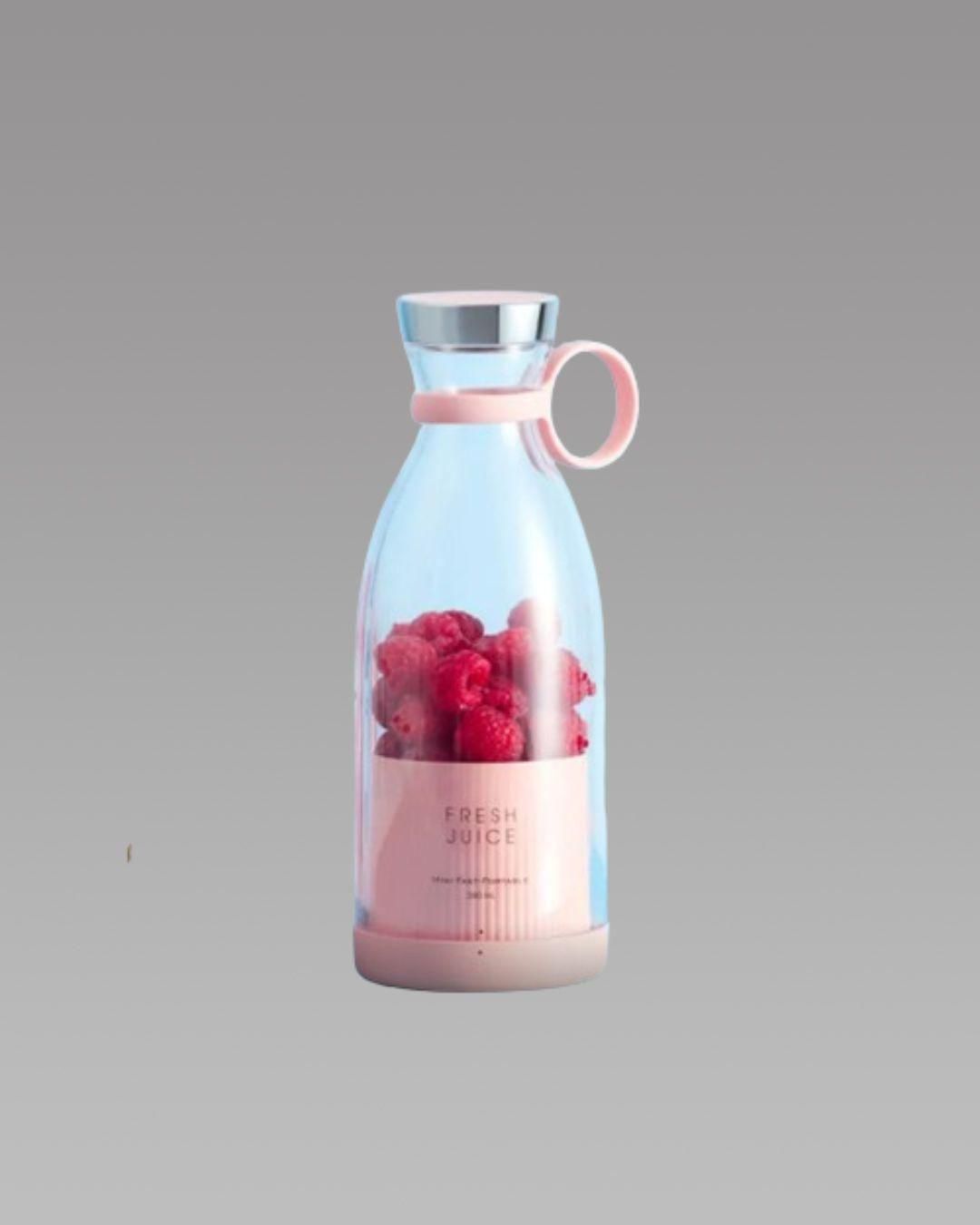 Bottle with a design of raspberries and 'Fresh Juice' text on a gray background