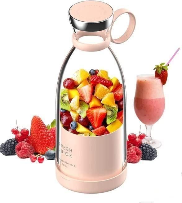 Fruit-filled blender with a glass of smoothie and additional fruits on a white background